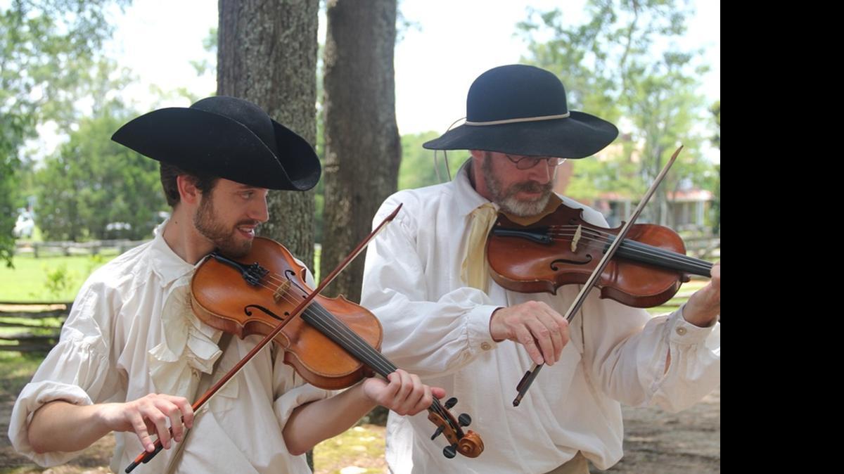 
Fiddlers Nash Lyle and Zach Lemhouse play tunes at Historic Brattonsville in McConnells. Music will be part of the Independence Day celebration at Hightower Hall set for 10 a.m.-4 p.m. July 4. 
