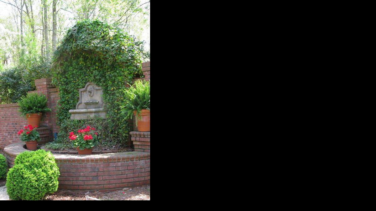 
The garden of Kim and Mike Climer is part of the Master Gardeners of York County’s Home Tour April 25 in Rock Hill. The Climer’s garden features a brick patio and a pea gravel path bordered by boxwoods leading to a wall fountain. A tall holly hedge further defines the area and provides privacy.
