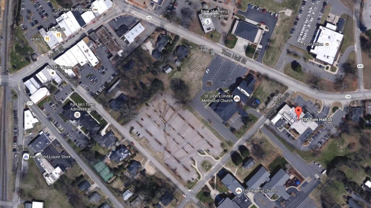 The town of Fort Mill is buying two pieces of property on Tom Hall Street and the buildings on them.