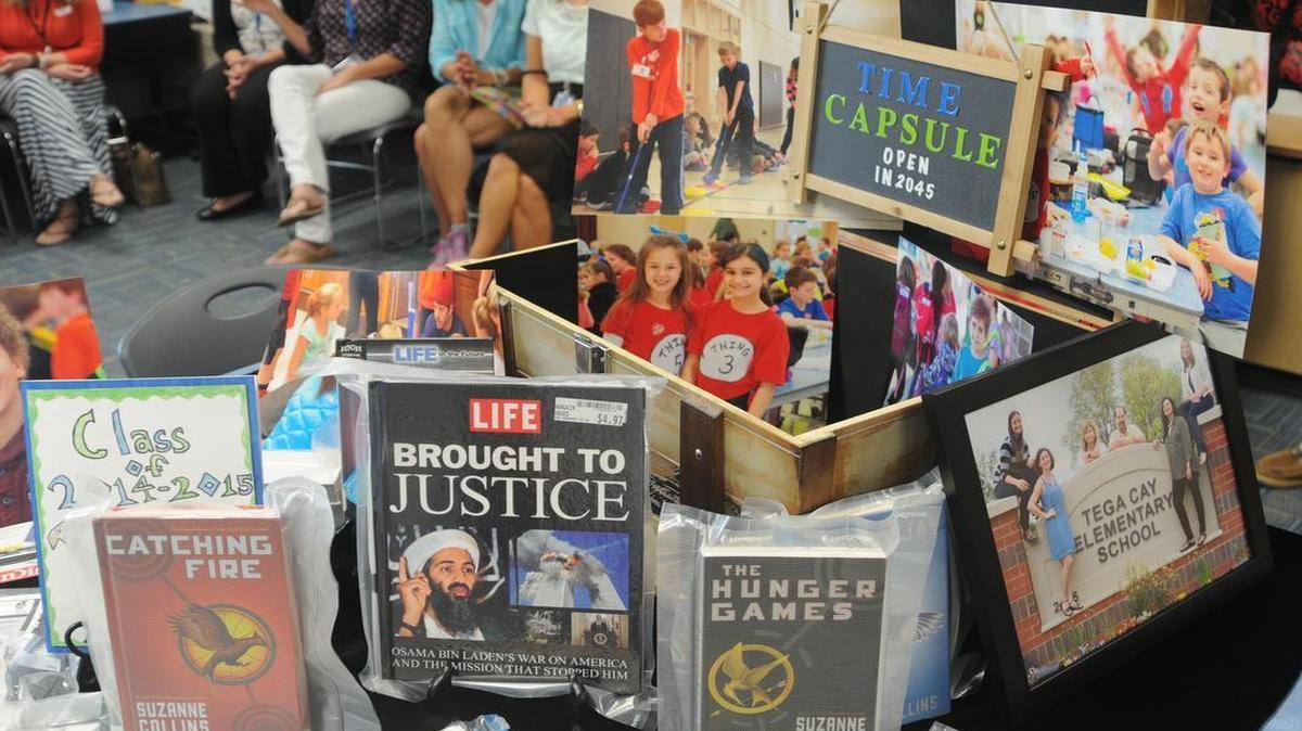 
Books, magazines and other items went into the time capsule at Tega Cay Elementary School.
