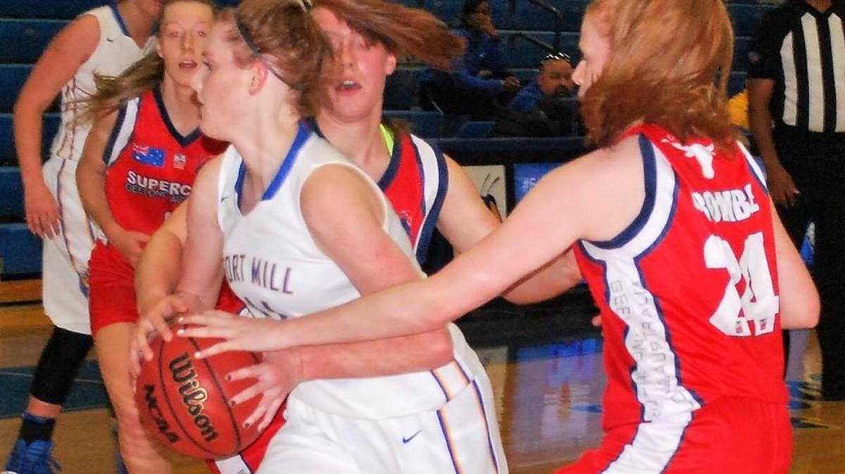 Annika Ford of Fort Mill tries to get out of a trap against the Geelong Supercats girl’s team.