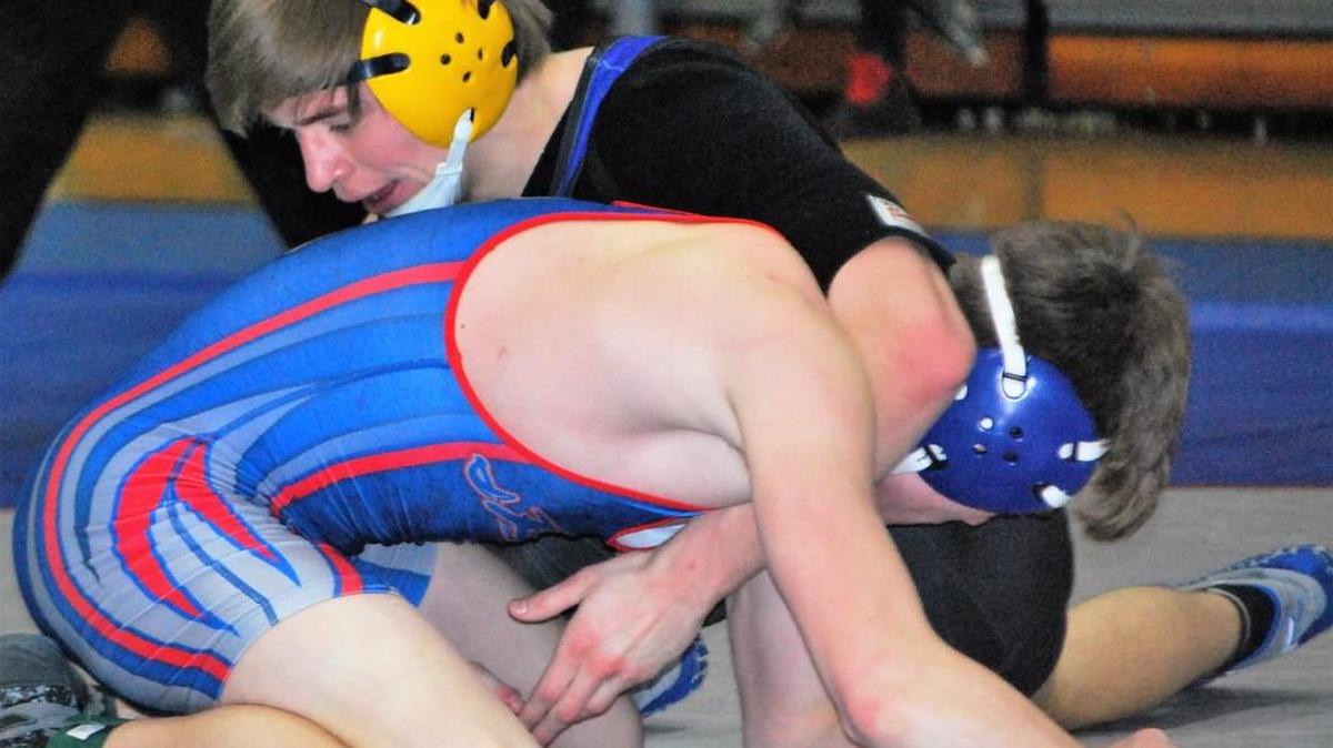 Fort Mill’s Brody Claassen (top) came back from an injury to score a third period pin against Byrnes, but the Jackets were not able to advance past the second round of the playoffs.