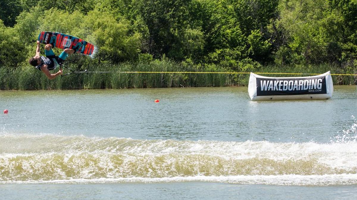 Austin Hair, formerly of Tega Cay, rides in the LCQ round of the Supra Pro Wakeboard Tour at Trinity Trails at Marine Creek Lake in Fort Worth, Texas, pulled by a Supra SA 550 tow boat. Hair will be close to home on Lake Norman for a pro series June 18.