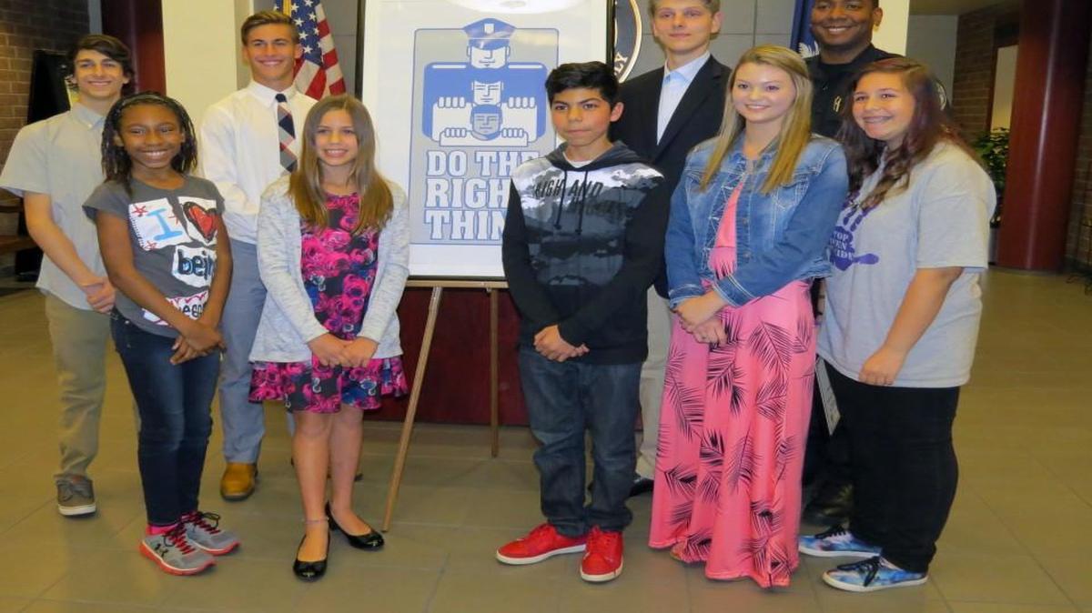DTRT winners honored last week are (back row from left): James Bow, Terrell Stauffer, Colton Lohmeyer and Fort Mill Police Officer Johnathan Gilbert and (front from left) Maya Talley, Ansley Archuleta, Kevin Garcia Leon, Abi Warmington and Janice Bunz. Not pictured are winners Benjamin Fenwick and Hannah Sumner.