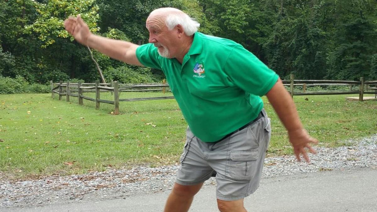 
Rich Guicheteau participates in road bowling, a sport popular in Ireland and some parts of the U.S. A small steel ball, or bowl is thrown along a predetermined course of roads. The team with the fewest number of throws to the finish line wins.
