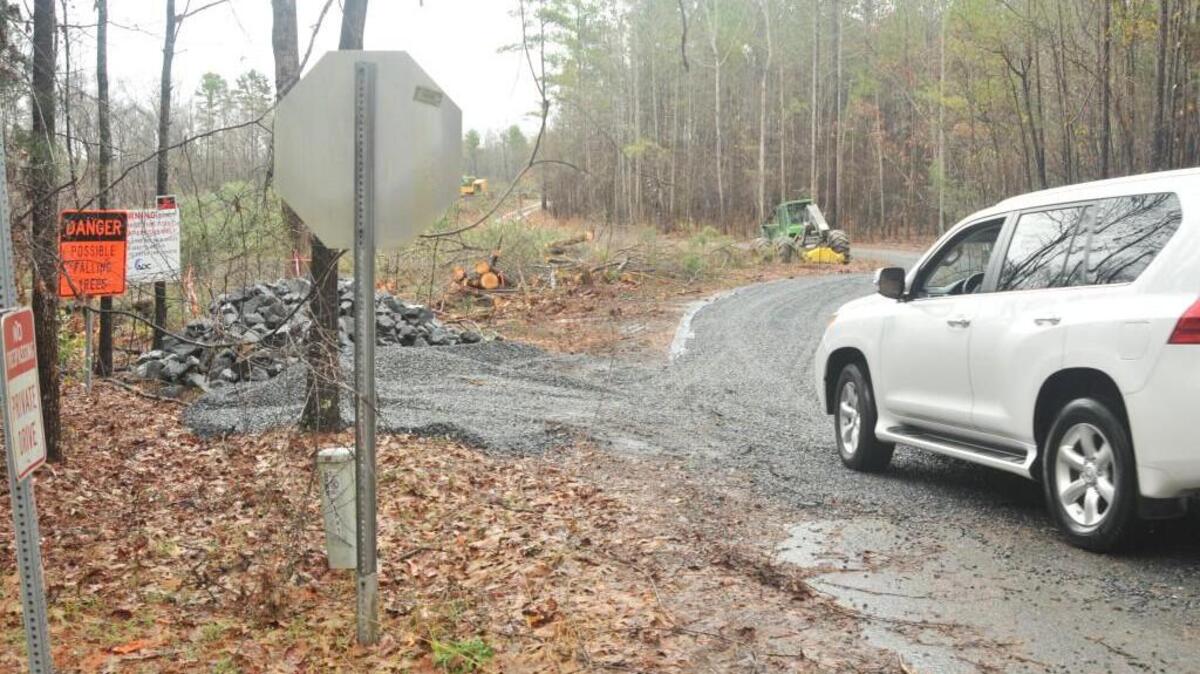 A resident drives on Baker Lane in Lake Wylie on Thursday. Residents there are upset with development for Lake Crest.