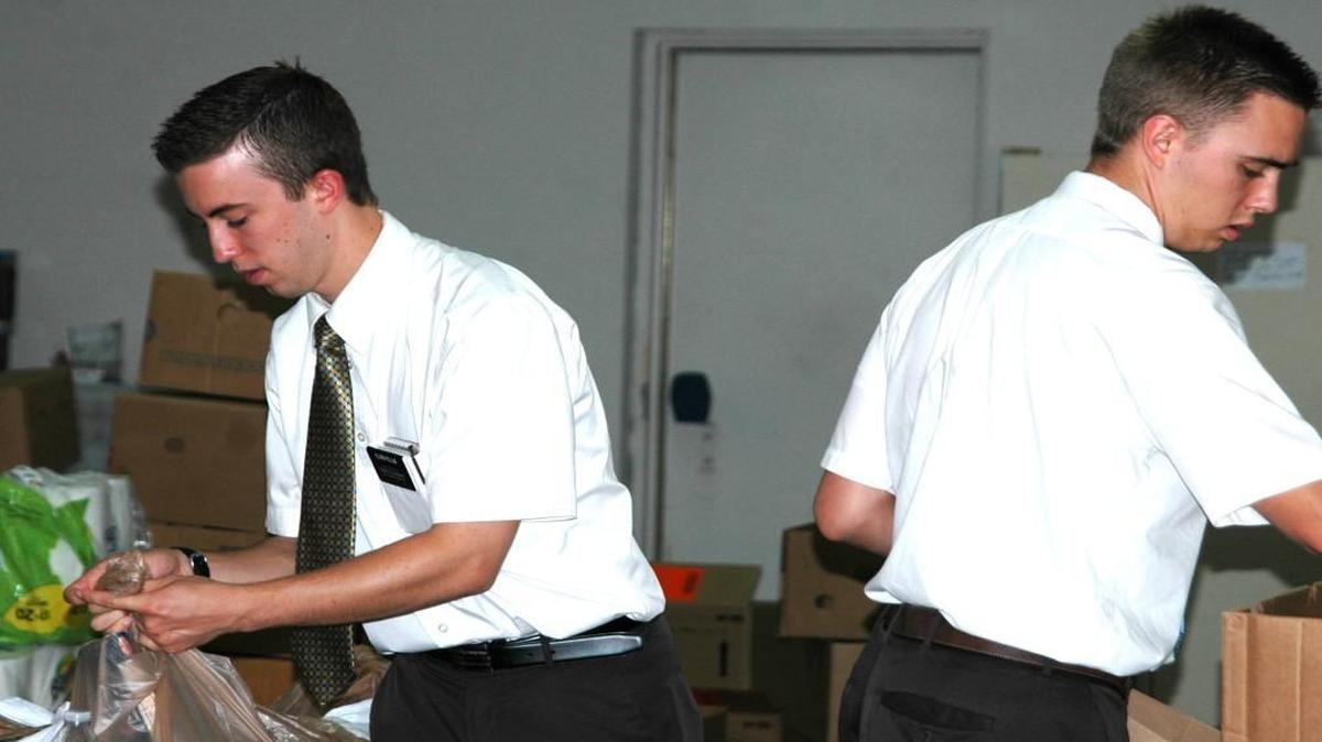 
Volunteers Jacob (left) and Jordan Ellis pack groceries at the temporary Fort Mill Care Center pantry. The Care Center closed at noon Friday and will reopen Aug. 31 at its new facility on Old Nation Road.
