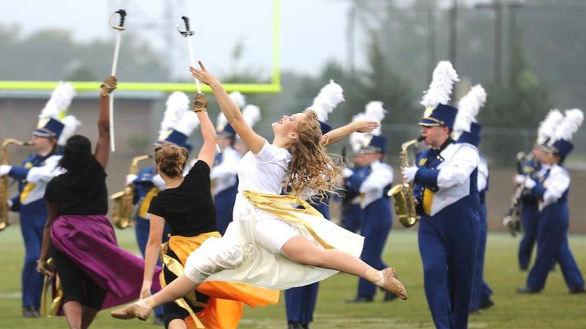 
Morgan Arnette goes airborne as Natasha from "War and Peace" during the Fort Mill Band's performance Sept. 26.
