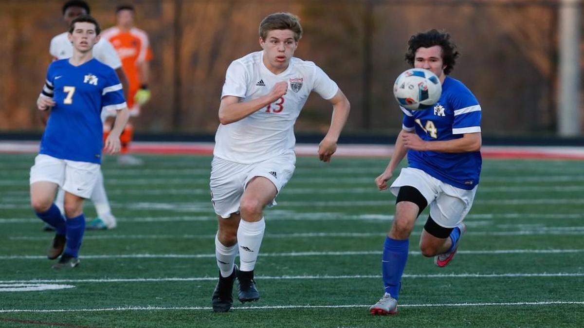 Nation Ford's Brad Young (13) brings the ball down the field against Fort Mill in a March 15 match. The Falcons cracked the top 20 in USA Today’s weekly poll.