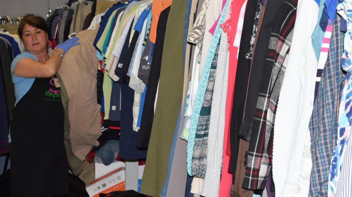 Julie Sussex, volunteer at Sweet Repeat Thrift Store in Lake Wylie, sorts donations March 16.