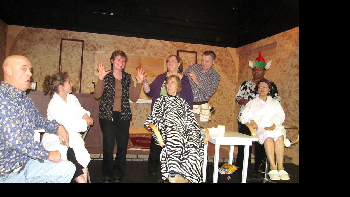 
Fort Mill Community Playhouse actors, from left, Tom Moody, Marcie Levine Jacobs, Cathy Schaefer, Karen Lee, Vicki Rose, David Cruse, Kecia Capers and Susan Capotosto rehearse a scene from “Hallelujah Girls.” The playhouse, which needs a new home, has asked the town to help it rehabilitate the old Center Theater.
