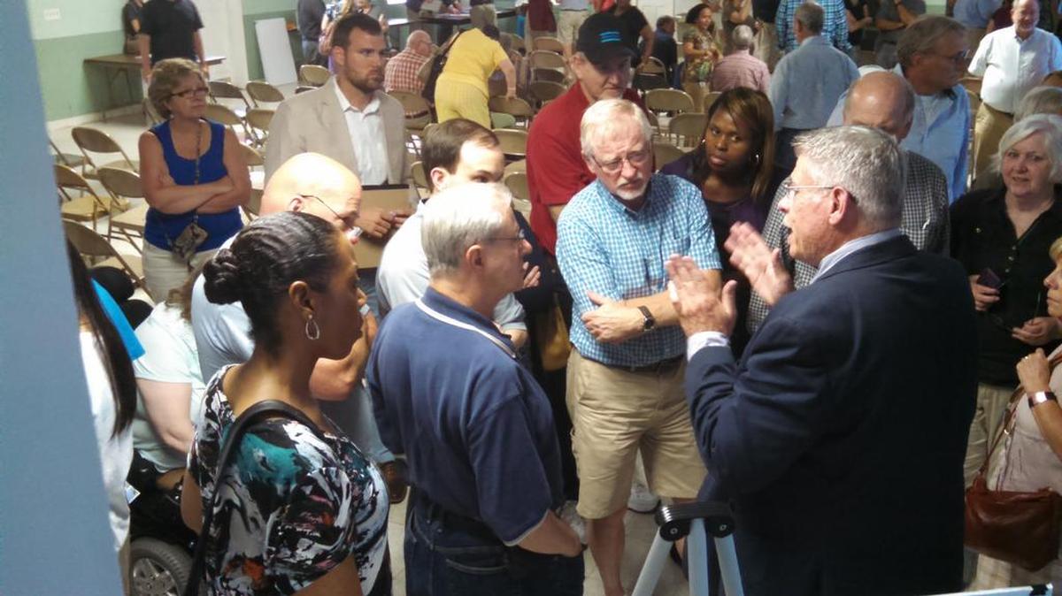 Randy Goddard with Design Resource Group discusses traffic impact with residents Thursday night at a public meeting on the Grier property, which could add more than 800 apartments and and townhomes at Brown-Grier and Steele Creek roads.