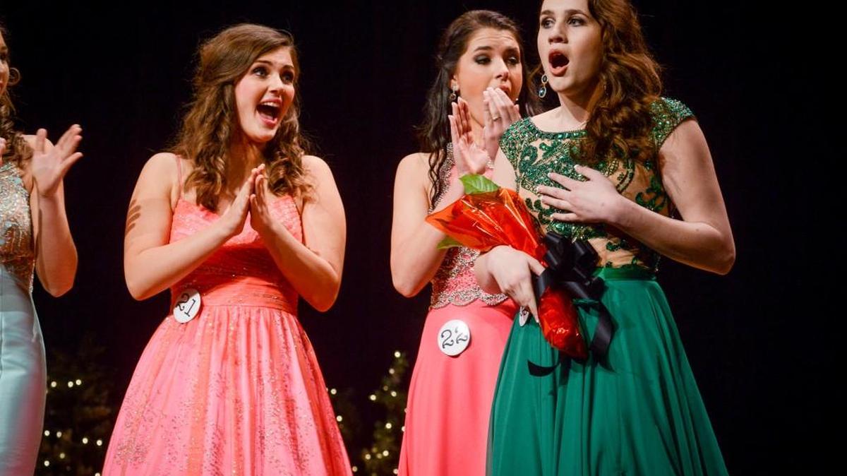 Isabella Heusing (right) reacts to being named Miss Sophomore.