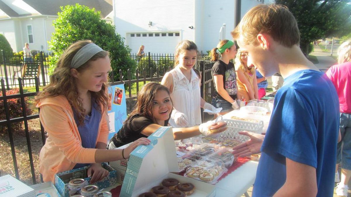 
Friends Kailey Cota, Mari Hudson, Sarah Williams, Olivia Kuebler and Kylie Levosky, all Fort Mill Middle School students and residents of Springfield, along with their friend Ryan Williams, helped raise more than $1,000 with an annual bake sale for an orphanage.
