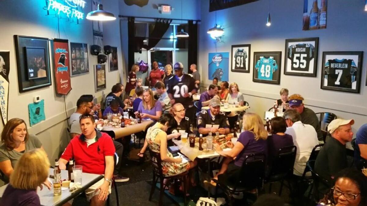 Fans gather in Towne Tavern in Fort Mill to watch football all season long.
