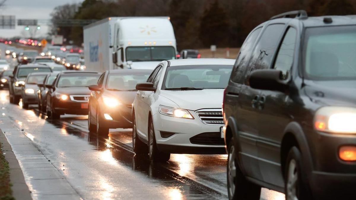
Cars travel along an area where new growth is planned on Carowinds Blvd.
