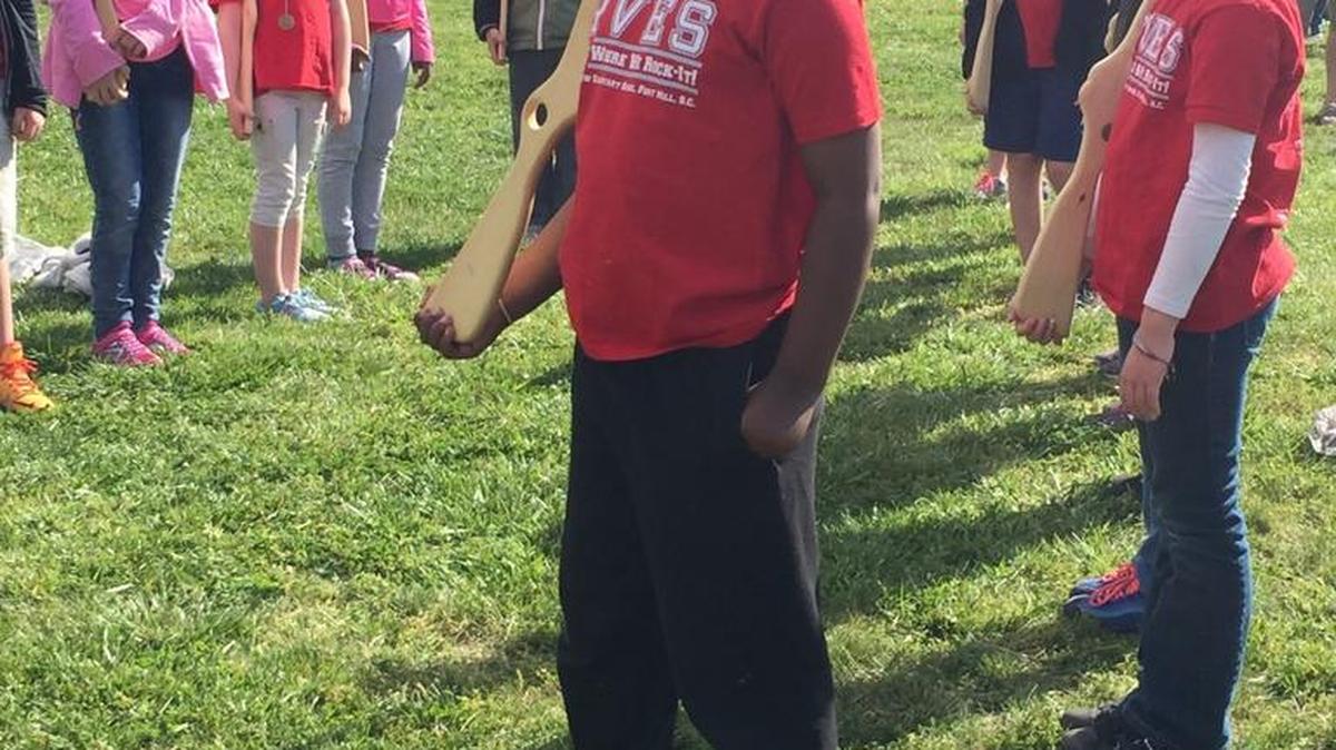 Jalen Taylor, a third grader at Riverview Elementary, participates in a militia drill.