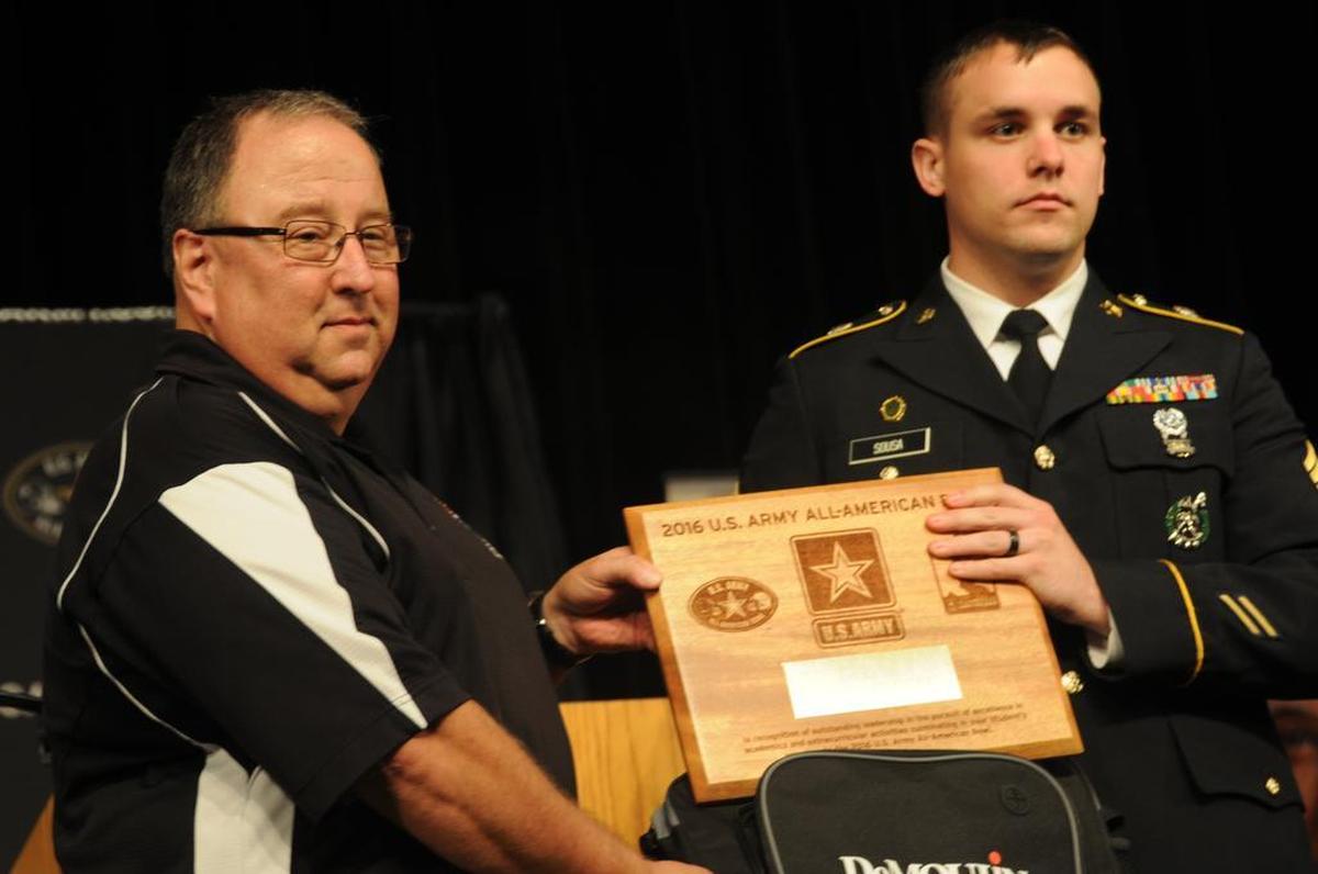 Then Nation Ford High School band director Martin Dickey receives an honor in 2015 during the announcement that student Brian Liu would perform in the U.S. Army All-American Marching Band. Dickey was selected to assist with the band as a director.
