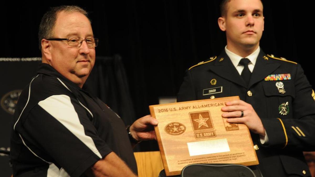 Then Nation Ford High School band director Martin Dickey receives an honor in 2015 during the announcement that student Brian Liu would perform in the U.S. Army All-American Marching Band. Dickey was selected to assist with the band as a director.