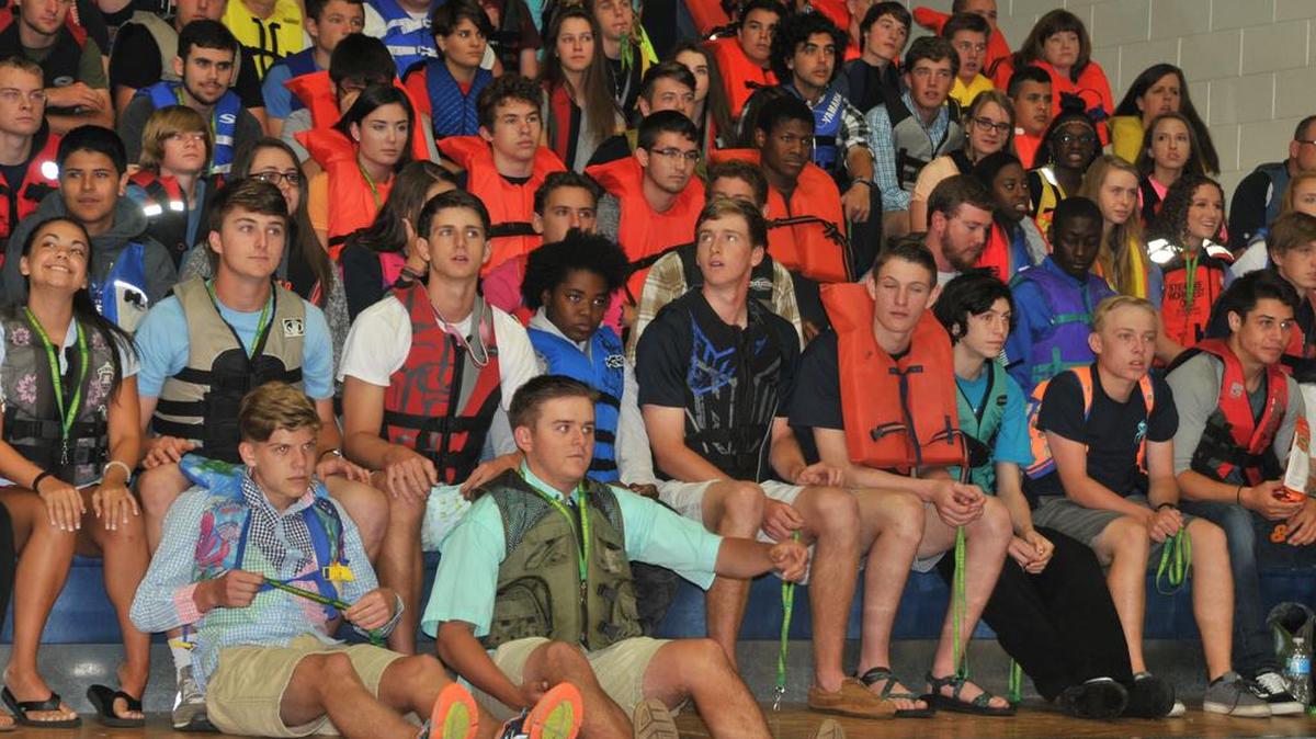 About 130 students and staff at Clover High School wore life jackets Wednesday to promote water safety this summer.