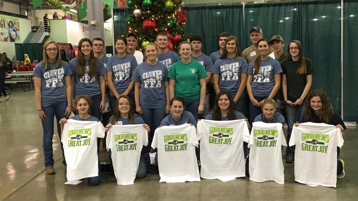 Clover High School Future Farmers of America Club members helped ready packages for Operation Christmas Child. In front from left are Heidi Sanders, Mackenzie Campbell, Madison Hansen, Casey Eagan, Amara Varney and Jessica Killian. In middle are Brenna Allen, Dallas Nivens, Amarillo Nivens, Anna Dulin, Emma Hansen, Catherine Faulkner, Madison Lovelace and Erin Ramsdale. In back are Dakota Bolin, Hunter Robinson, Tripp Bolin, Bryson Gilbert, David Flanagan, Caleb Robinson, Jake Helms.