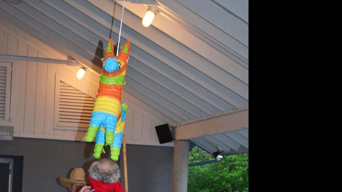 
Bob Powers attempts to bring down pinata at the River Hills-Lake Wylie Lions Club’s Cinco de Mayo party May 5 at River Hills Marina pavilion.
