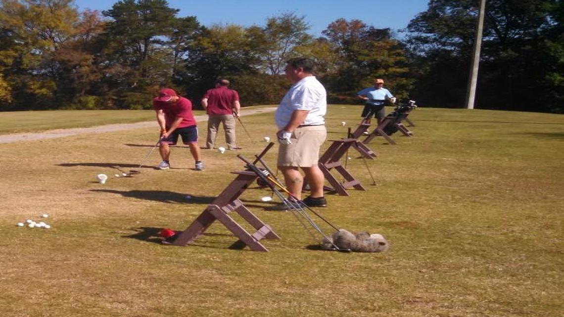 Players tee off at the Regent Park Golf Course driving range. York County Council approved first reading of a rezoning request that paves the way for closing the course and replacing it with new homes.