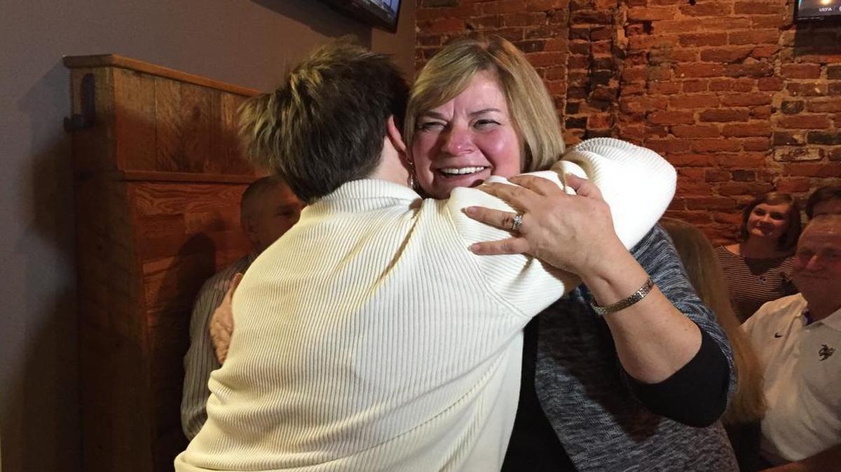 Fort Mill Mayor-elect Guynn Savage hugs supporter Betty Aldridge at Hobo’s in downtown Fort Mill Tuesday night.