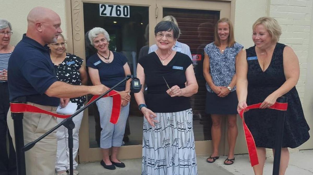 
Fort Mill Mayor Danny Funerburk, left, speaks at the ribbon cutting of the Fort Mill Care Center’s new home on 2760 Old Nation Road. The FMCC’s Director Carol Higgins, center, and President Diana Bernard welcomed the community to visit the center’s new home.
