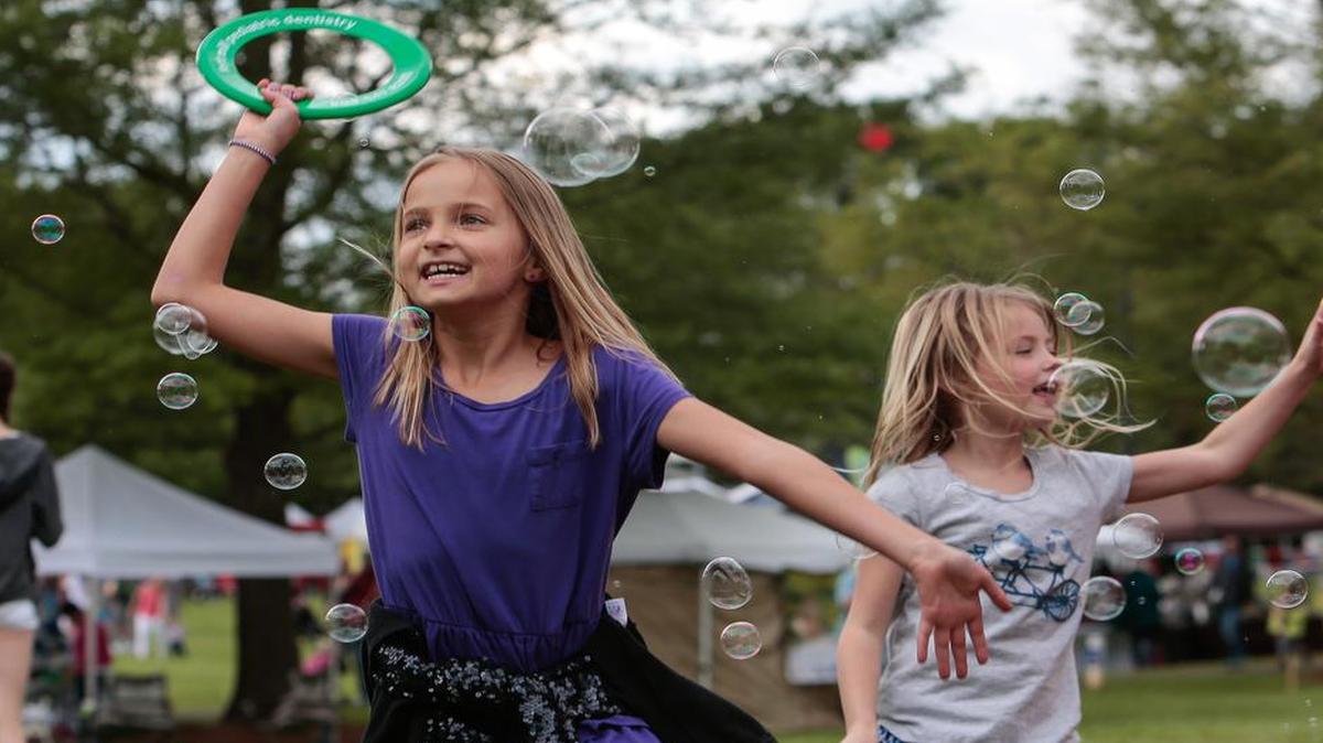 
Katie Covelli and Kinsley Polk enjoy the festivities. Friday night at the Fort Mill Strawberry Festival. Day two gets underway Saturday. 
