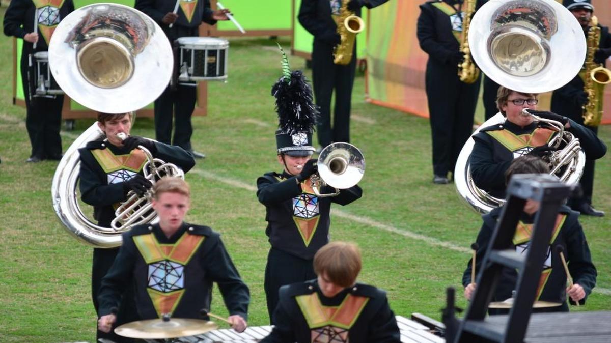 Brass and percussion players with the Nation Ford High band perform at the S.C. championships.