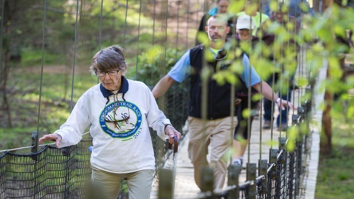 Anne Springs Close leads a three-mile hike at the Anne Springs Close Greenway during Earth Day. The Greenway is hoping to sign up 112 new donors for its Friends program.