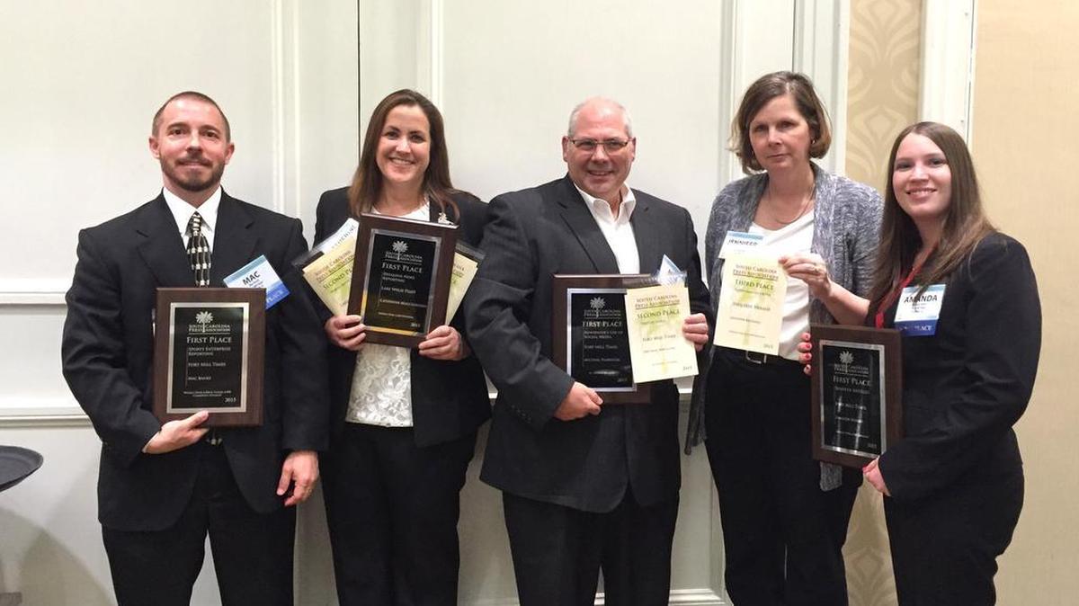 Mac Banks, Catherine Muccigrosso, Mike Harrison, Jennifer Becknell and Amanda Harris hold their awards at Saturday's SCPA annual meeting and awards luncheon.