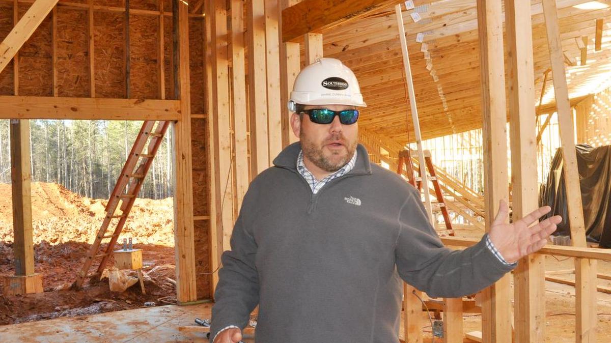 Creative Kids Lake Wylie project manager Shane Cunningham talks Jan. 29 about the rooms under construction at the site on Charlotte Highway.