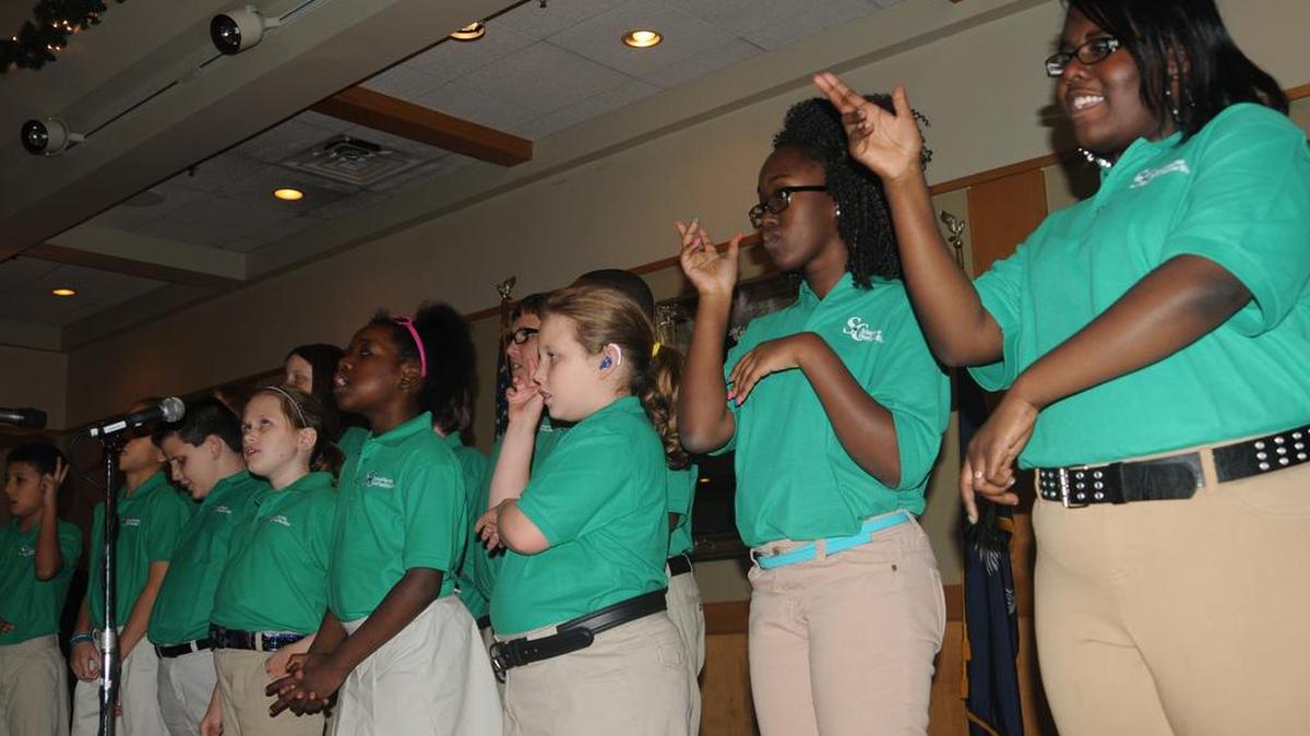 Students with the South Carolina School for the Deaf and Blind perform at the holiday dinner Dec. 1 for the River Hills/Lake Wylie Lions Club.