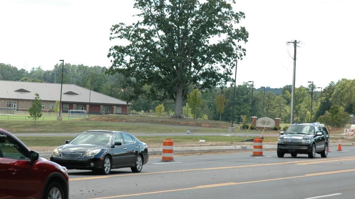 Lane closures will be intermittent on Tega Cay Drive as road paving and other work is underway as part of completing Hubert Graham Way.