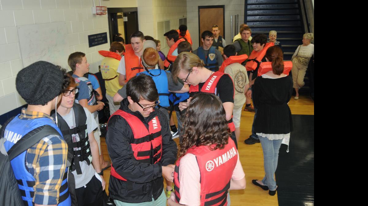 
About 50 students at Clover High School wore life jackets May 14 to raise awareness for boating safety.
