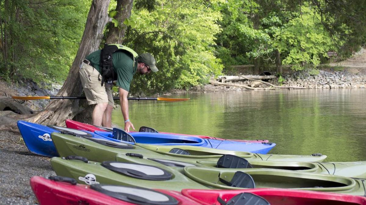 Chad Moore with Mecklenburg County Parks and Recreation gets ready for an evening kayak tour on Lake Wylie at McDowell Nature Preserve, 15222 York Road, Steele Creek.