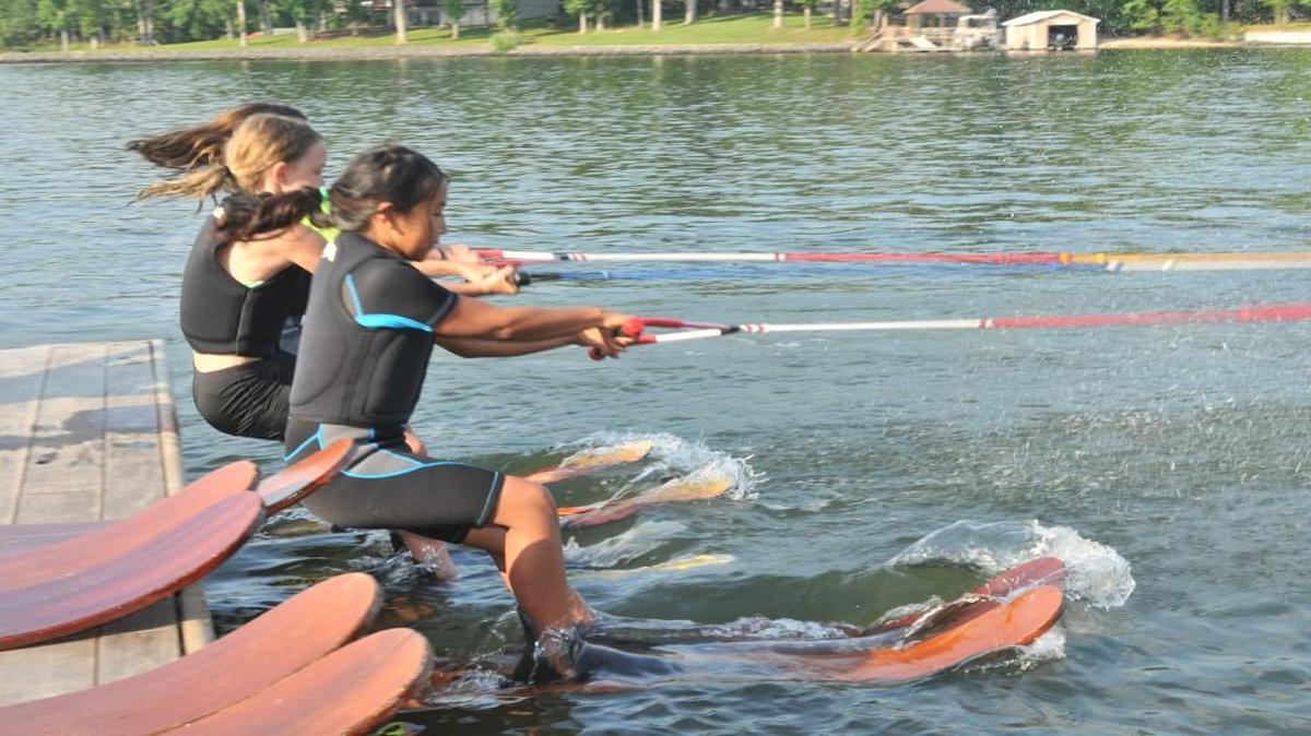Carolina Show Ski Team members practice Thursday at Windjammer Park in Tega Cay, ahead of their season debut June 3.