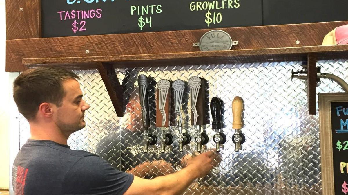 
Charles Bergman of Full Spectrum Brewing Co. in Fort Mill pours a craft brew. The brewery will hold its grand opening Aug. 29.
