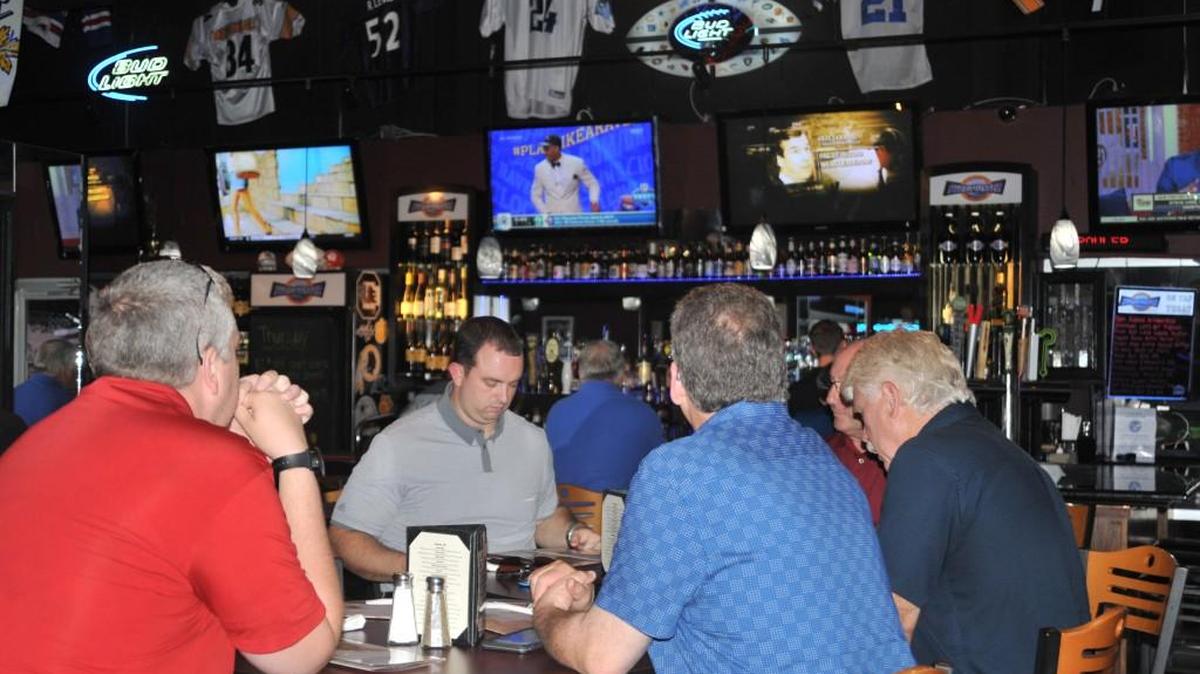 Diners eat lunch at Sweetwater in Lake Wylie on Thursday, just hours before the University of South Carolina kicks off a full season of local football action that will benefit many area restaurants.