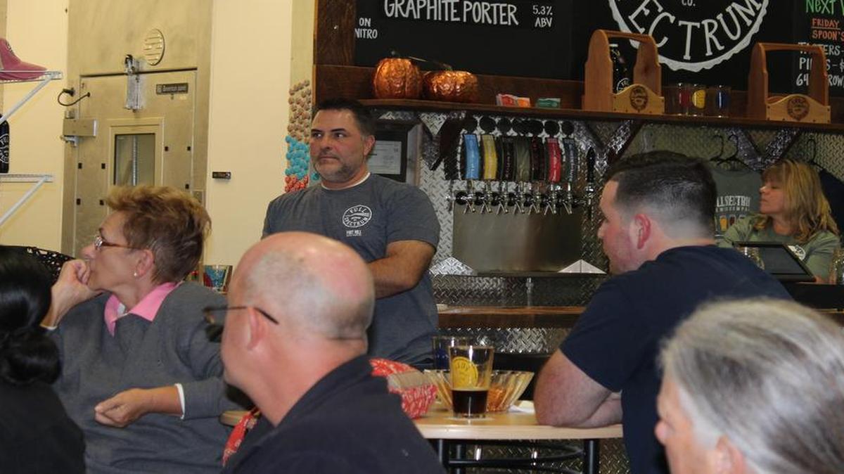 Brew master Troy Bigelow is behind the bar at Full Spectrum, Fort Mill’s first brewery, where the November session of Tastefully Local was held last week.