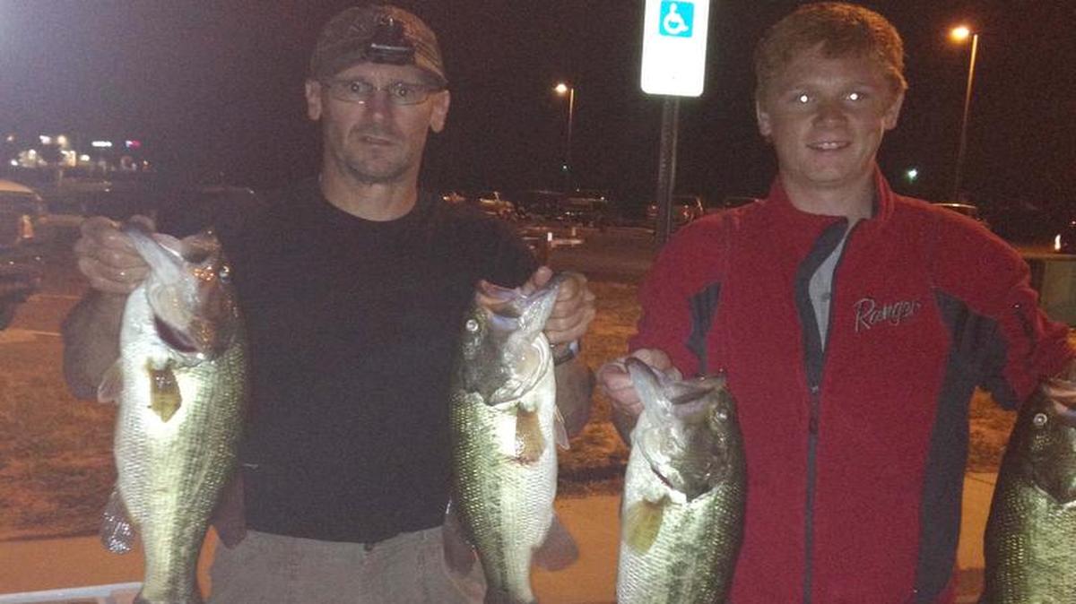 
The father-son team of Mark and Zach Leech hold up their winning catches May 21 during Thursday Night Tournament Trail on Lake Wylie.
