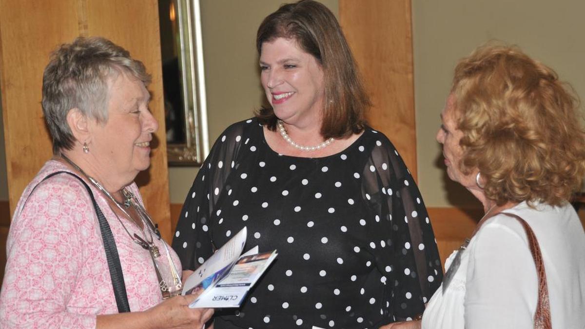 Allison Love, candidate for York County Council Dist. 2. seat, talks with residents following a debate with opponent Doug Meyer-Cuno at the Clover-Lake Wylie Republican Women luncheon May 13 at River Hills Country Club.