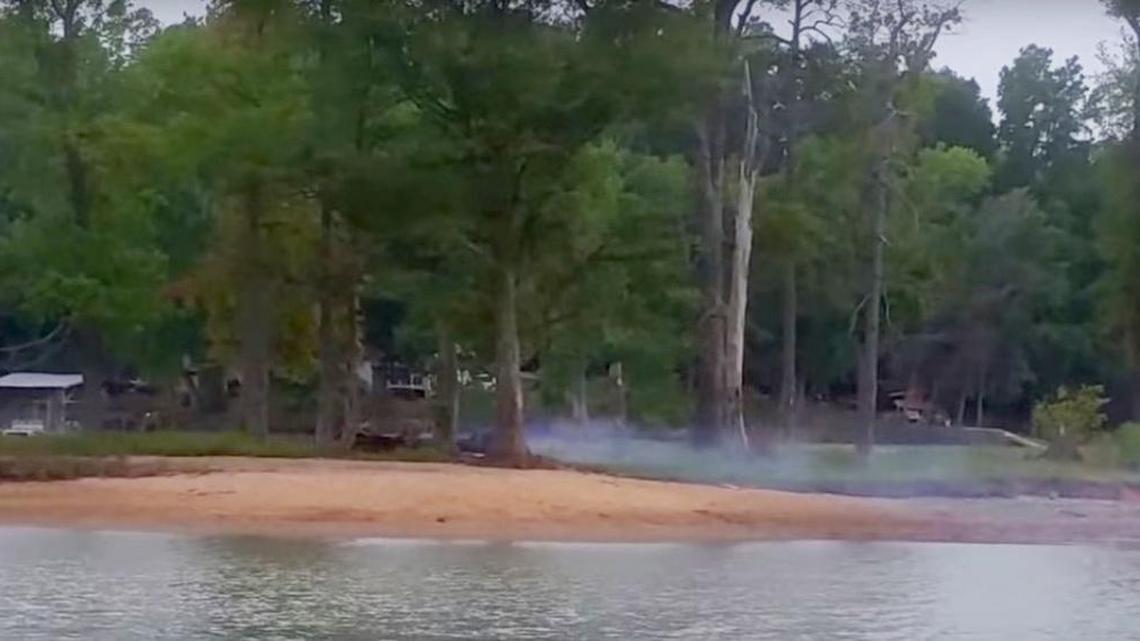 
Smoke is seen coming from an unattended fire Aug. 10 on an island in Concord Cove on Lake Wylie.
