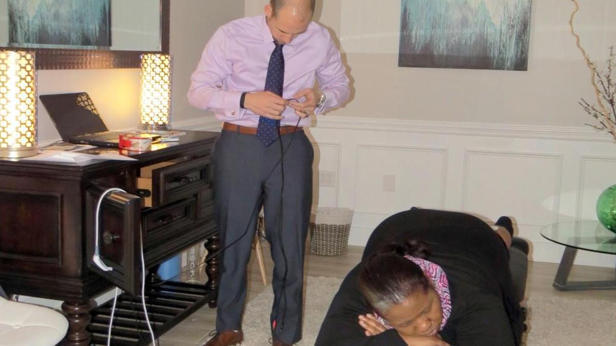 Dr. Jeff Matz, uses electrical stimulation on a client to help with swelling and inflammation.