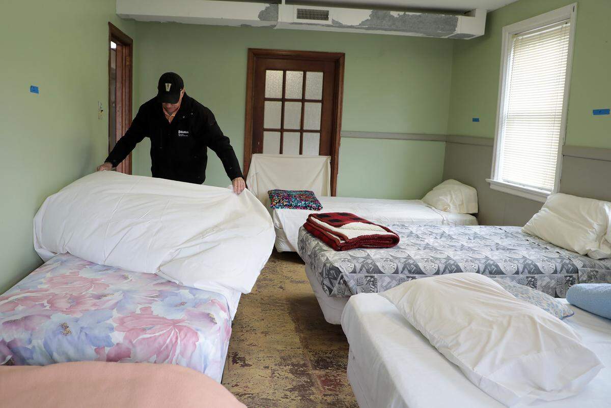 In this Herald file photo, Pete Richardson makes a bed at the Bethel Men’s Shelter. Some people without homes have been dropped off after hours in Rock Hill the past two years when there were no beds available.