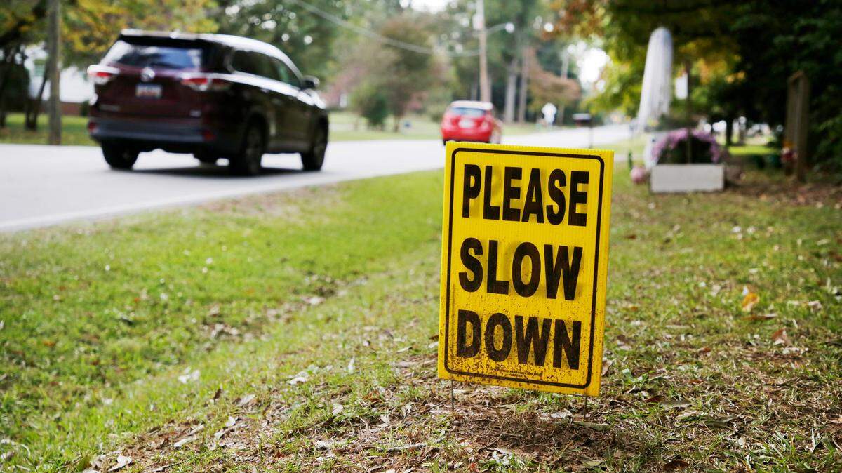 A resident on Ebinport Road in Rock Hill displays a sign asking drivers to “slow down.”
