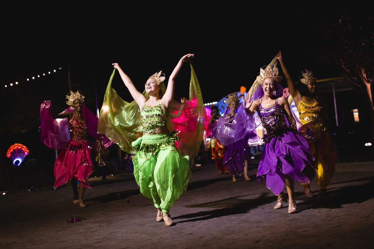 Dancers perform during the Spectacle of Color parade at the 2022 Grand Carnivale held at Carowinds. This will be the third year in a row the event is held at Carowinds.