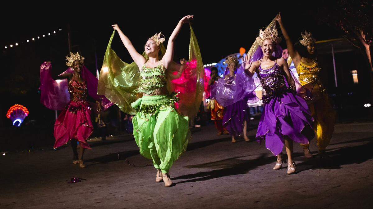 Dancers perform during the Spectacle of Color parade at the 2022 Grand Carnivale held at Carowinds. This will be the third year in a row the event is held at Carowinds.